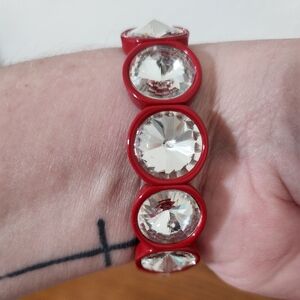 Plunder Design Red Elastic Bracelet with Crystals around it. Excellent Condition
